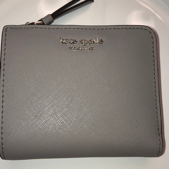 kate spade Handbags - Kate Spade cameron small l-zip bifold wallet